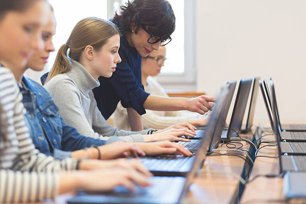 female students learning computer programming 1